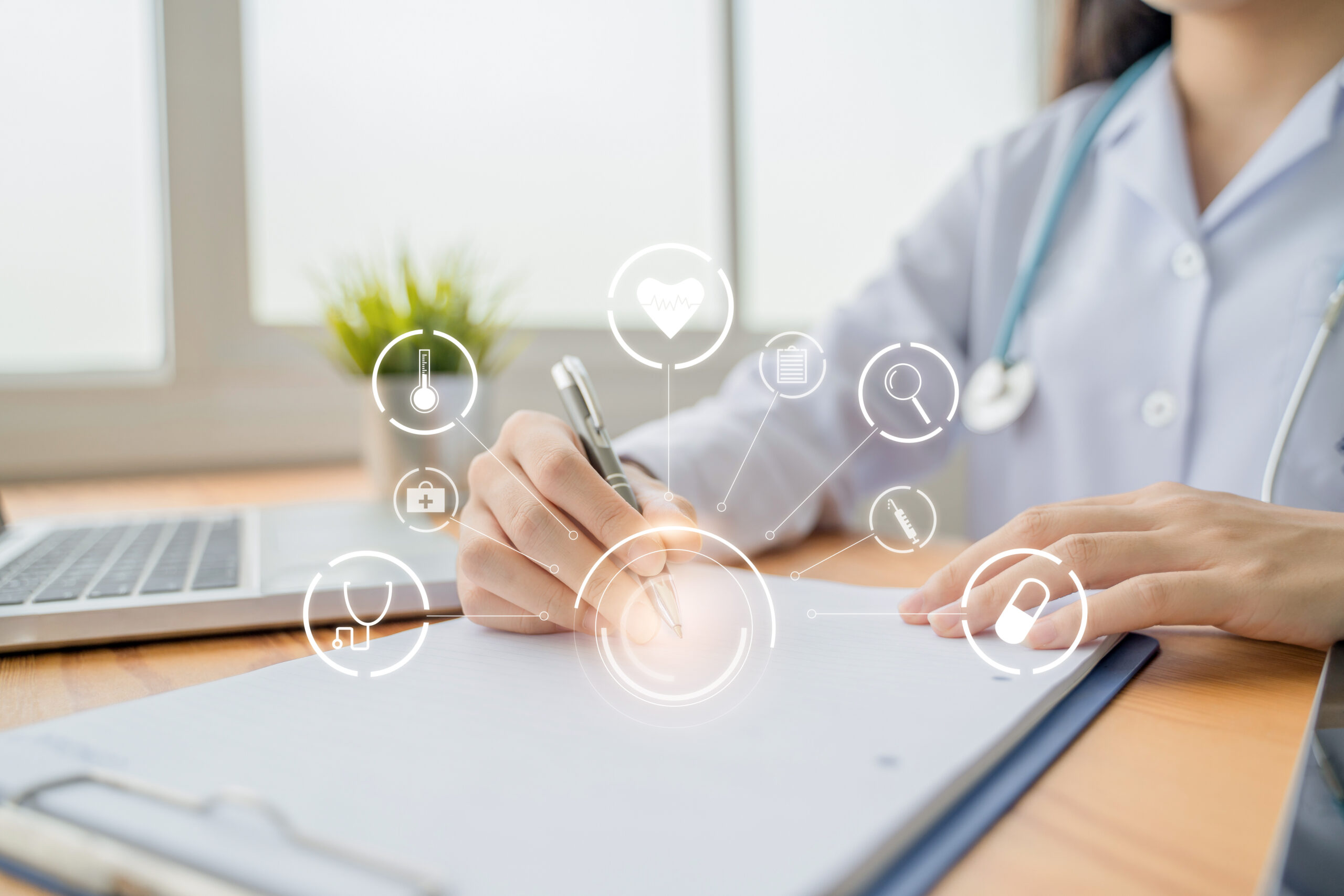 healthcare and medical care working from home concept, beautiful female Asian doctor working in home office close up writing one clipboard diagnosing patients health using computer laptop and document